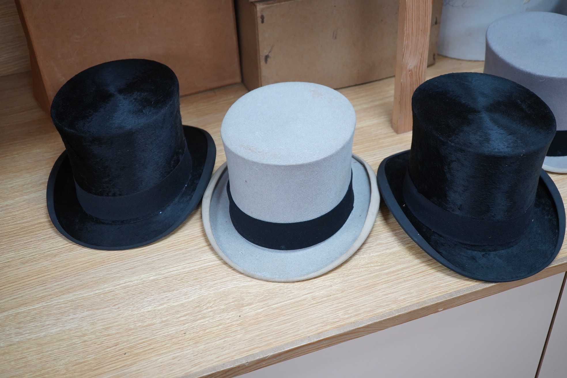 A group of five assorted top and bowler hats, boxed. Condition- varies